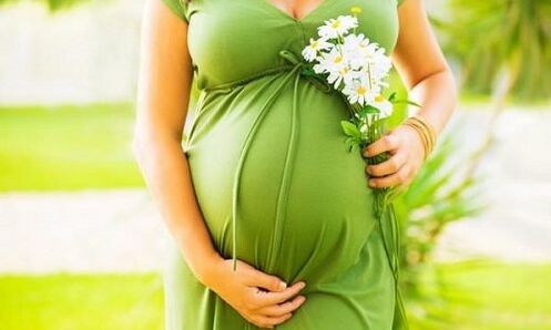 Pregnant woman with varicose veins on her legs